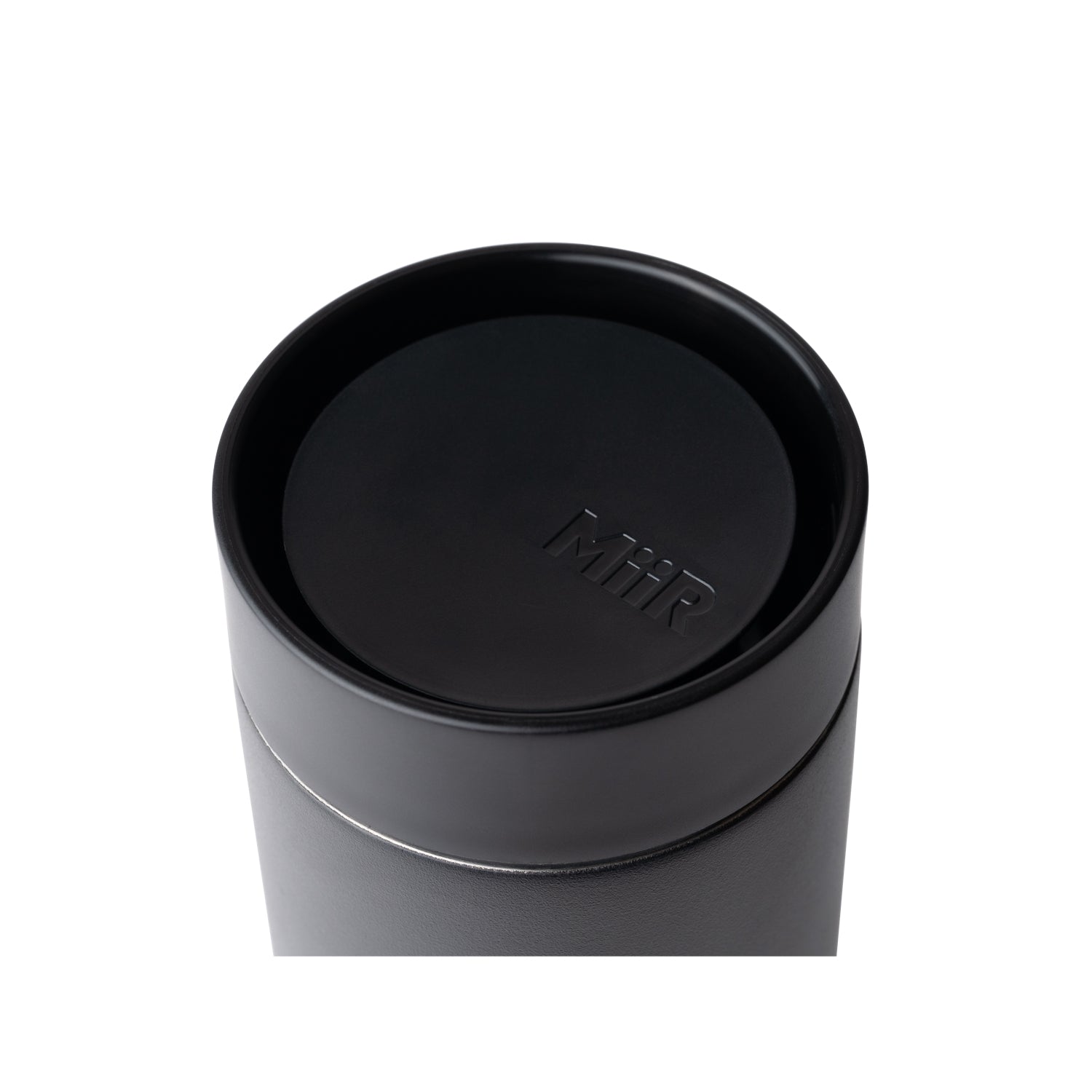 MiiR 360 Traveler Lid in black on top of 360 Traveler close up.