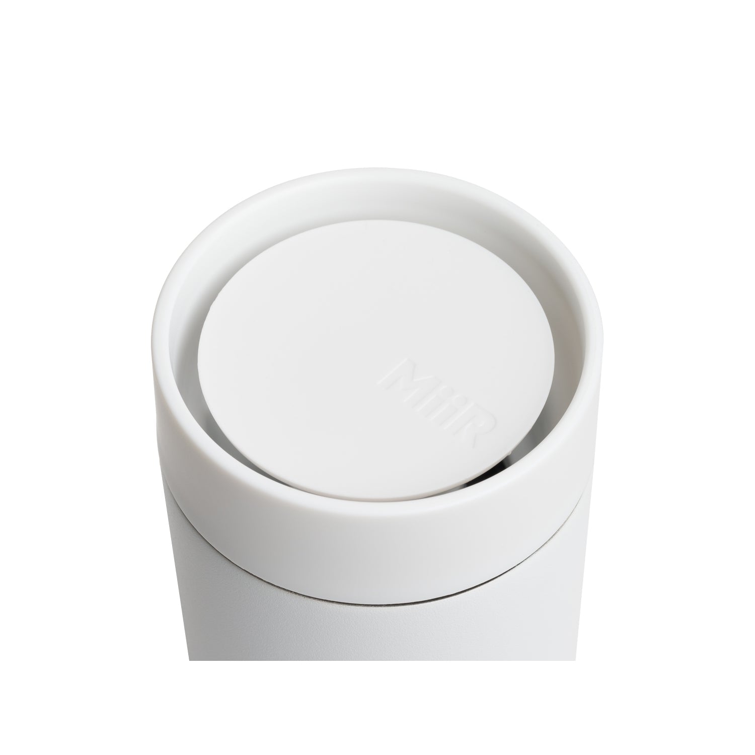 Top of MiiR 360 Traveler Lid in white on top of 360 Traveler close up.